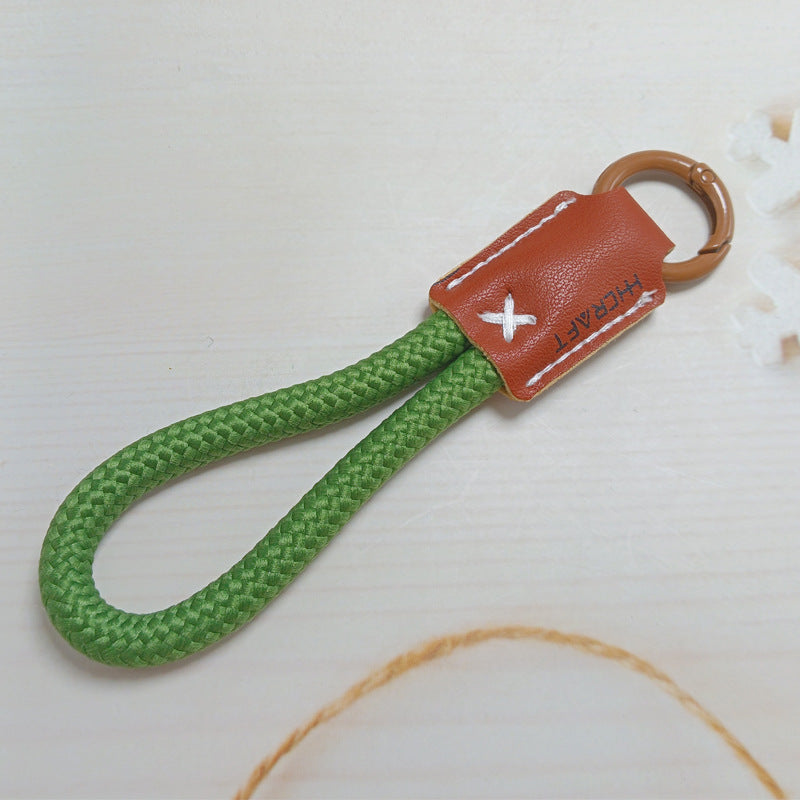 Easy-to-use durable key chain holder; compact design for organized keys & bag charm.