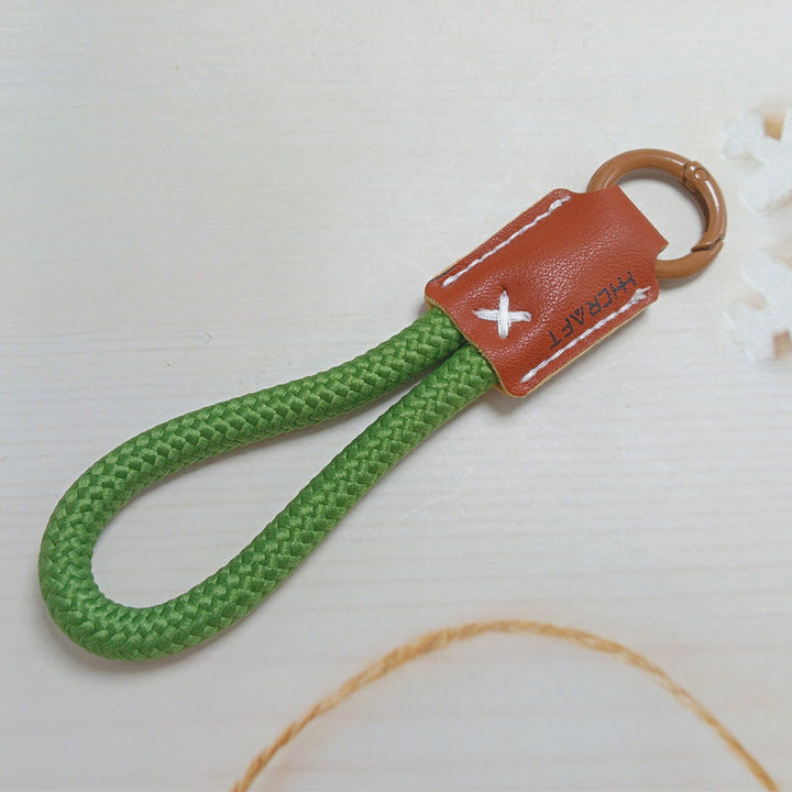 Easy-to-use durable key chain holder; compact design for organized keys & bag charm.