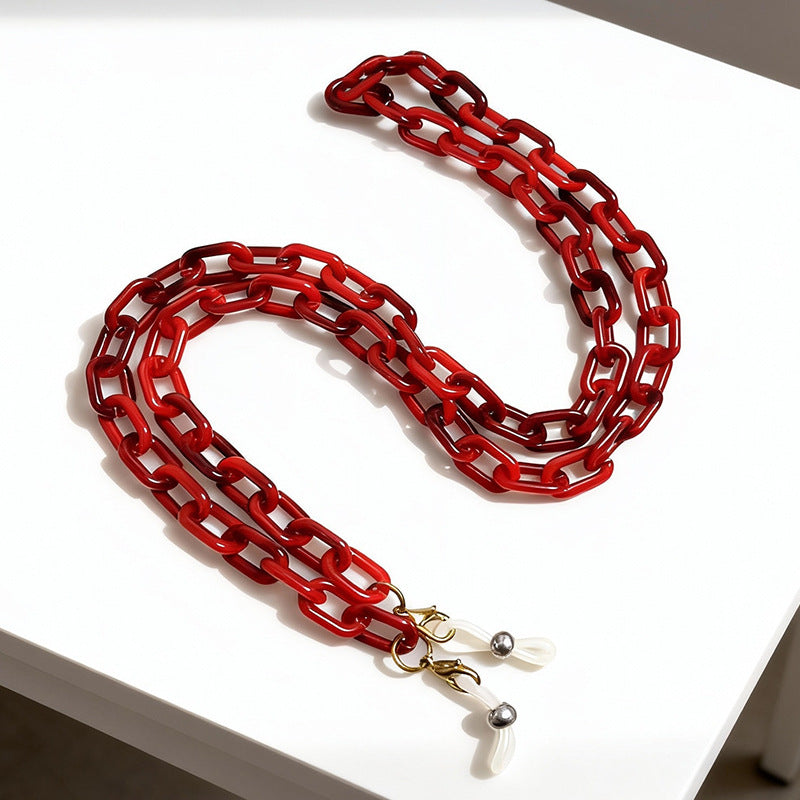 Stylish unisex eyeglass chain, lightweight plastic spectacle holder, anti-slip design.