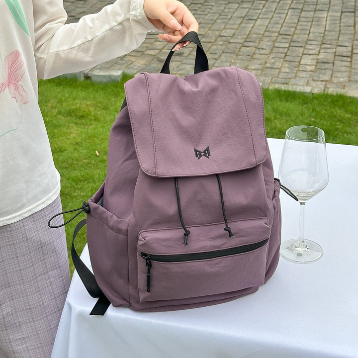 Unisex stylish hiking backpack, water-resistant, multi-pocket design, perfect for outdoor adventures & travel.