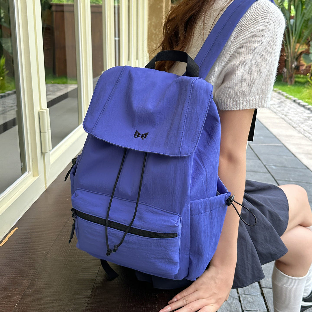 Stylish unisex travel backpack, lightweight & water-resistant, featuring multiple compartments for easy organization on trips.