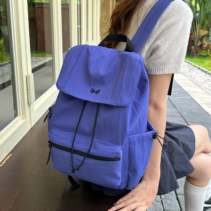 Stylish unisex travel backpack, lightweight & water-resistant, featuring multiple compartments for easy organization on trips.