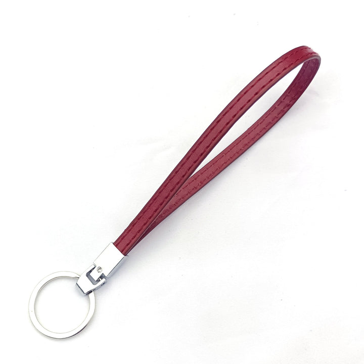 Vibrant red key holder, a durable and portable keychain organizer. A stylish accessory for organized keys.