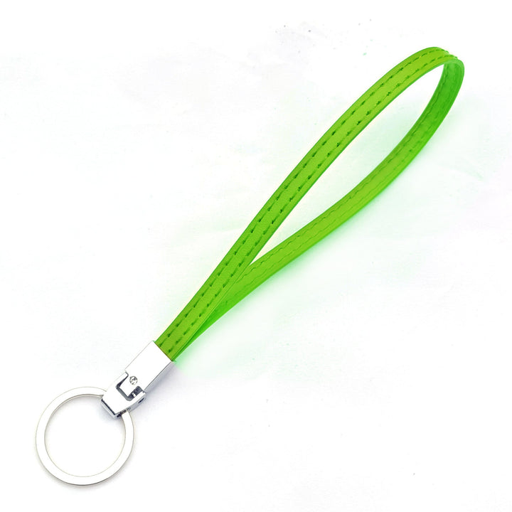 Stylish accessory: metallic key organizer in hand, showcasing its modern design & portability. Unisex gift.