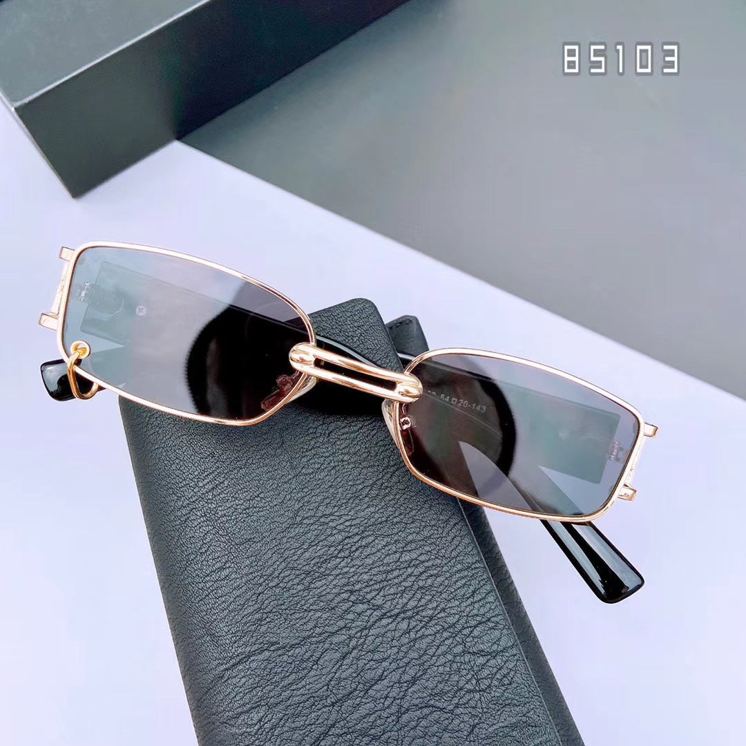 Fashionable modern unisex rectangular sunglasses. Stylish eyewear with essential UV protection for any look.