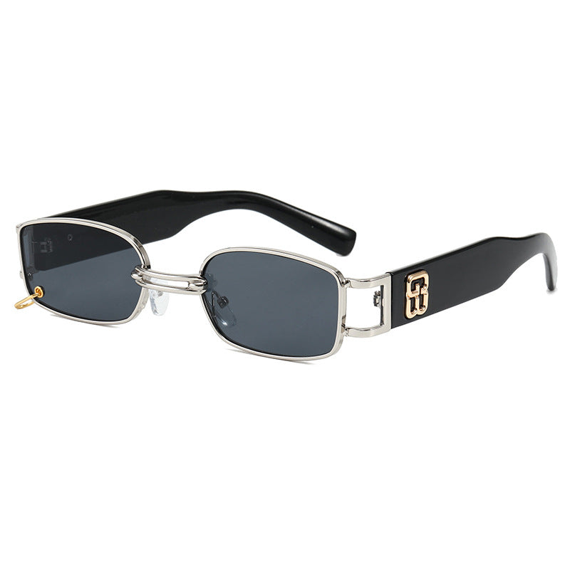 Modern rectangular unisex sunglasses with a sleek design. Provides reliable UV protection for daily wear.