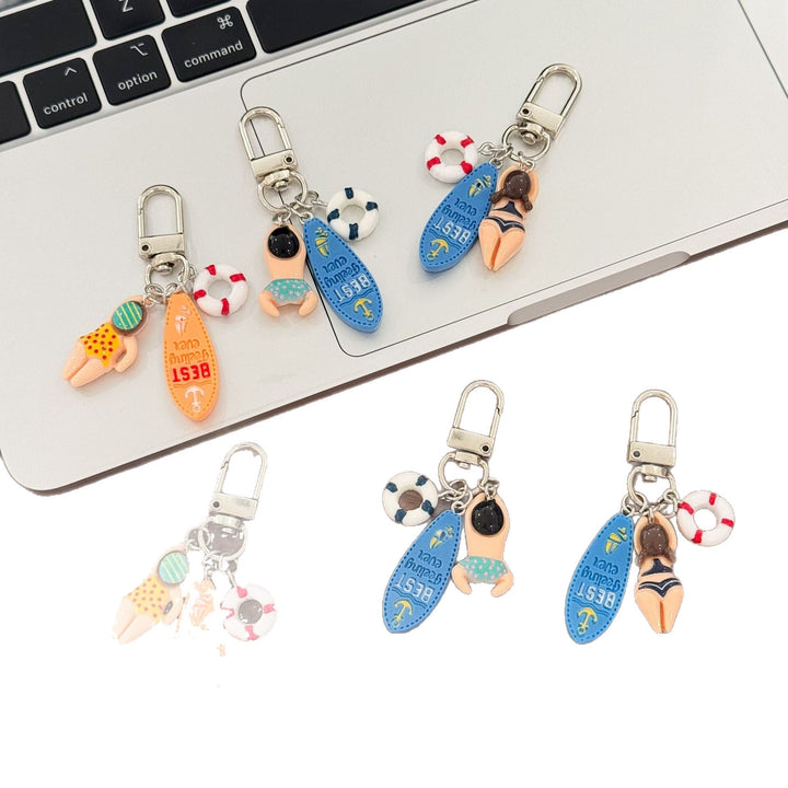 Durable plastic swimming keychain, a unique accessory and bag charm for water lovers.