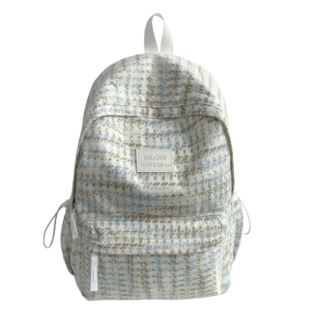 Stylish unisex textured daypack, ideal as a school, work, or travel backpack. Comfortable daily essential bag.
