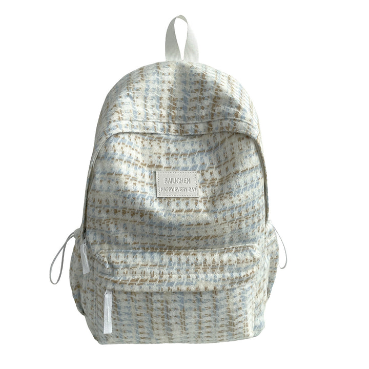 Stylish unisex textured daypack, ideal as a school, work, or travel backpack. Comfortable daily essential bag.