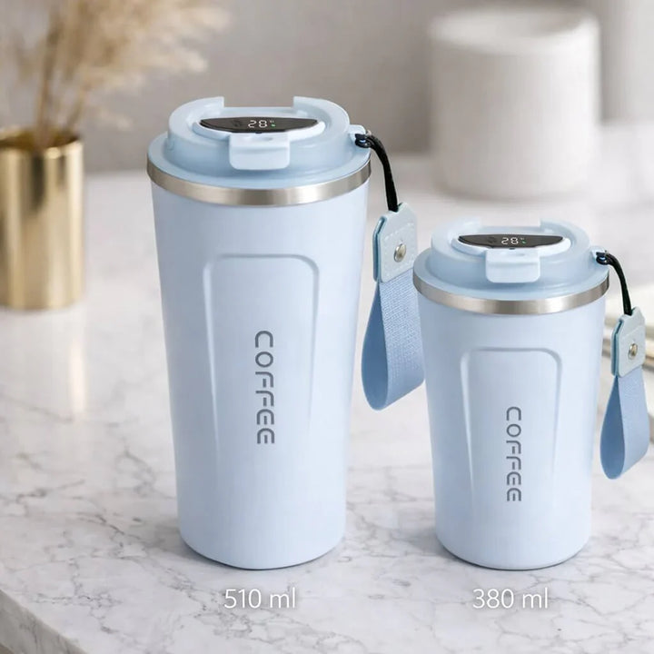 Smart thermal mug for commuters, stainless steel, digital temperature display, keeps drinks hot.