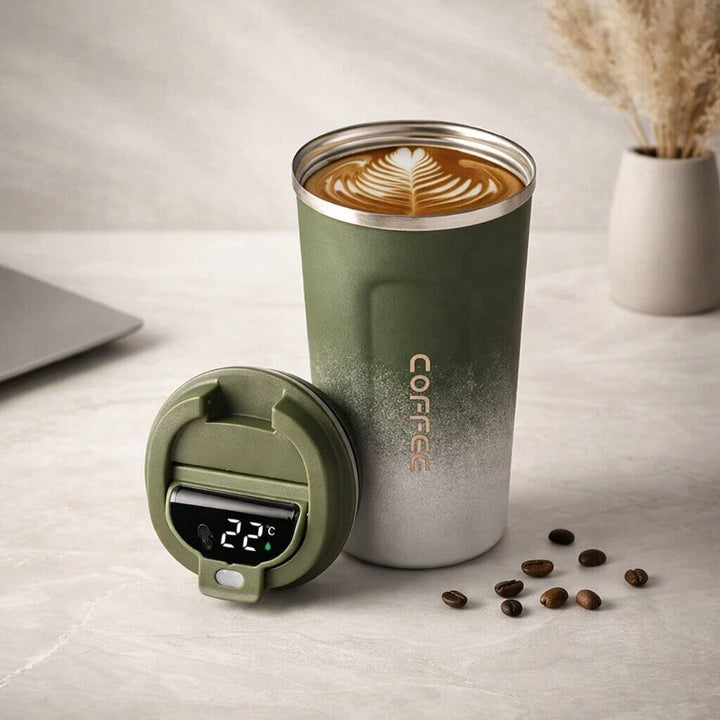 Modern thermal mug, leak-proof, digital display for precise temperature, keeps drinks hot for hours.