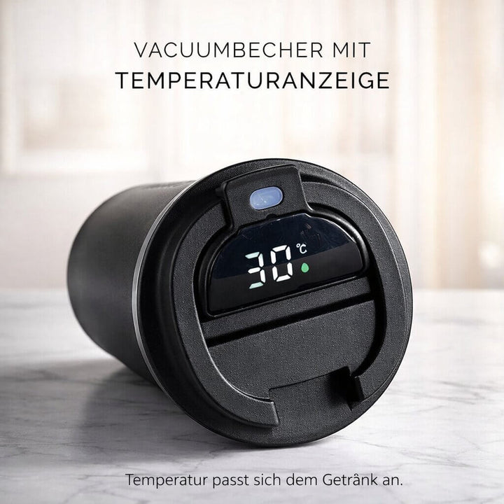 Leak-proof stainless steel thermal mug, portable for commute, shows temperature on digital display.