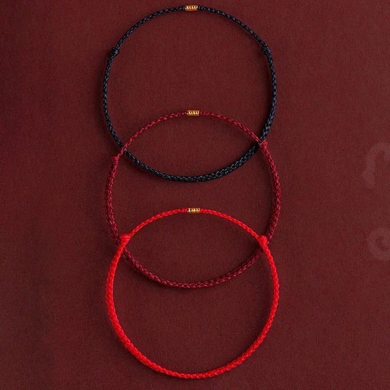 Handcrafted unisex energy bracelet. Adjustable Tibetan blessing in red or black for spiritual harmony & mindfulness.