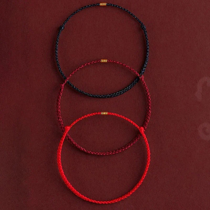 Handcrafted unisex energy bracelet. Adjustable Tibetan blessing in red or black for spiritual harmony & mindfulness.