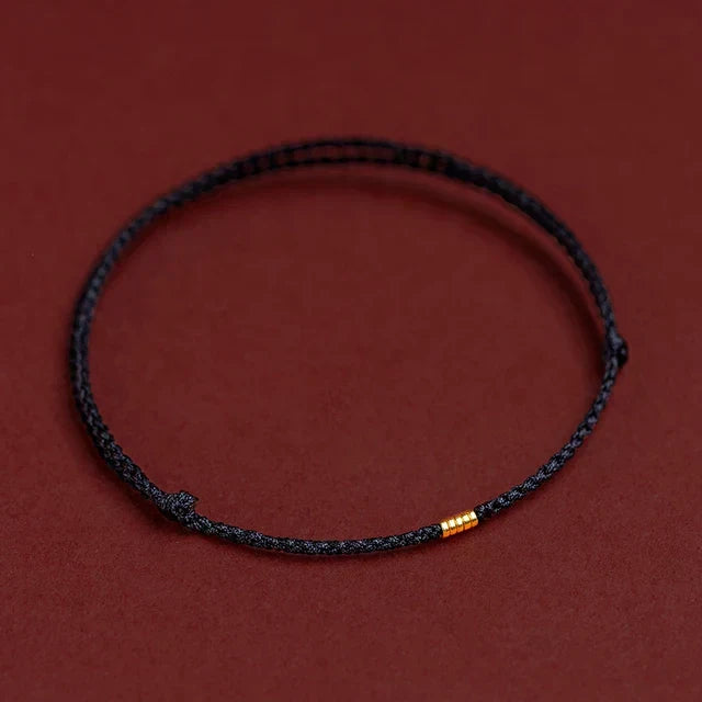 Handcrafted energy bracelet, a unisex Tibetan blessing for harmony. Adjustable spiritual accessory promotes mindfulness.