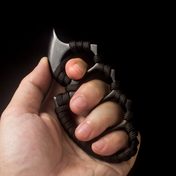 Tactical titanium self-defense security tool. Durable and compact for outdoor gear.