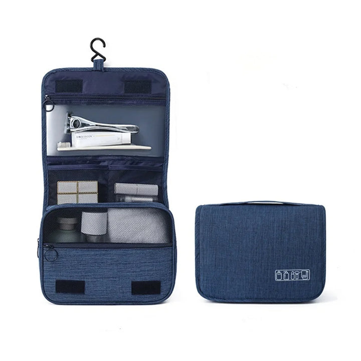 Unisex toiletry bag hanging from a hook, ready to organize your travel bathroom essentials. Portable & compact.