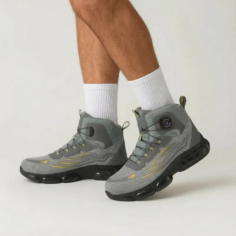 Two pairs of black & grey unisex waterproof safety boots, lightweight, durable, and comfortable for all work types.
