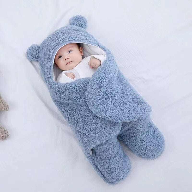 Plush ultra-soft baby swaddle blanket, quilted for warmth & featuring sweet bear ears, great for infant sleep.