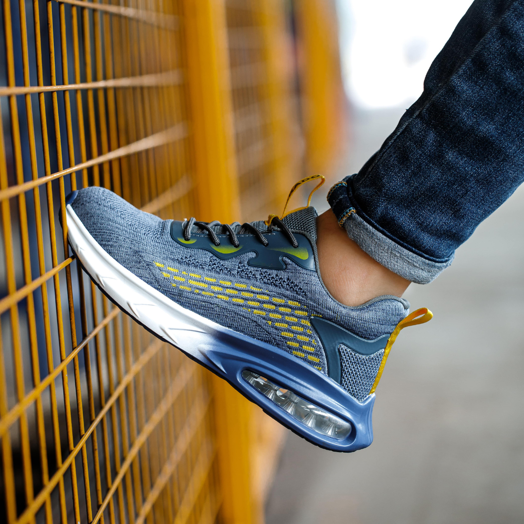 Ultralight safety shoes for men & women, offering orthopedic comfort and steel toe protection.