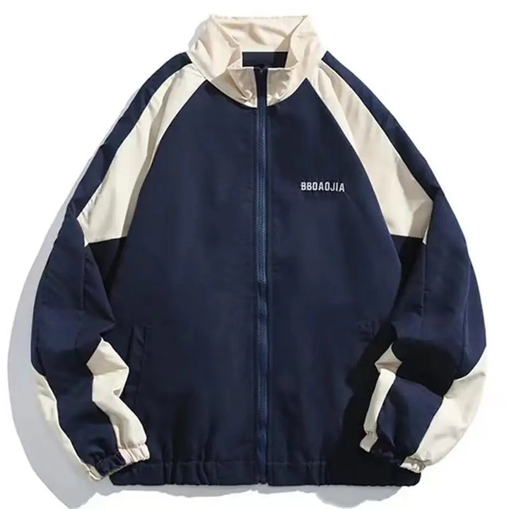 Urban style color-block windbreaker for men & women. Lightweight, weather-resistant jacket, ideal for casual layering.