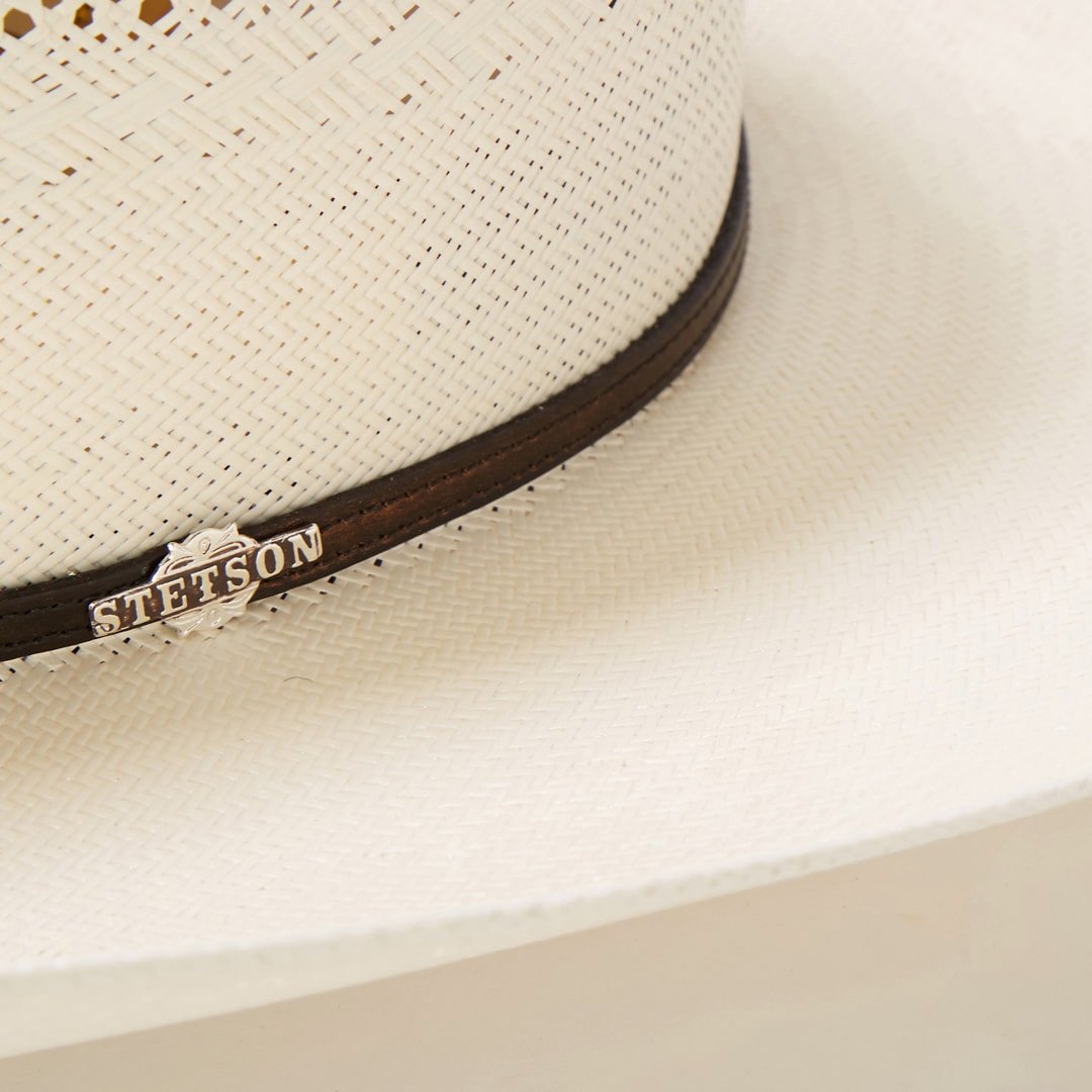 Ranch wear ventilated cowboy hat with a stylish leather band & silver accents. Unisex design, excellent summer sun protection.