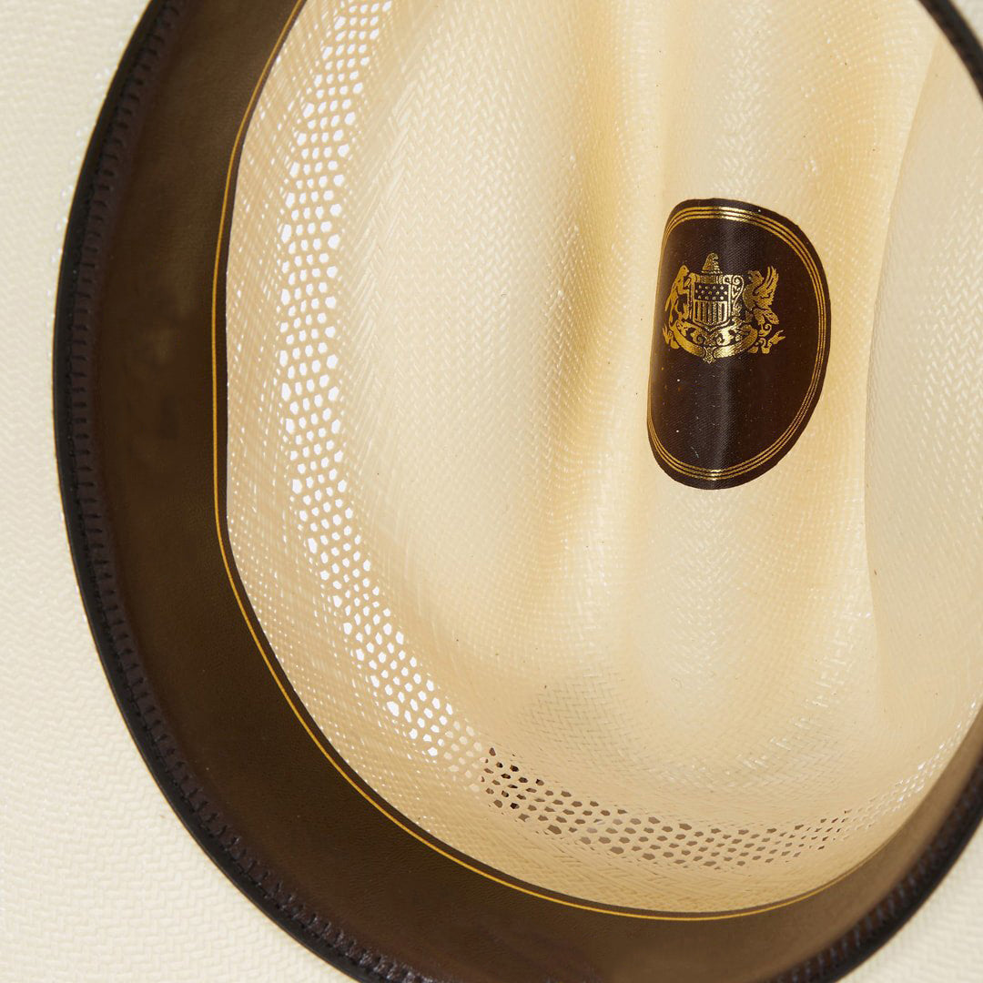 Outdoor unisex cowboy hat, ventilated for comfort. Features classic leather band & silver accents. Ideal for sun protection.