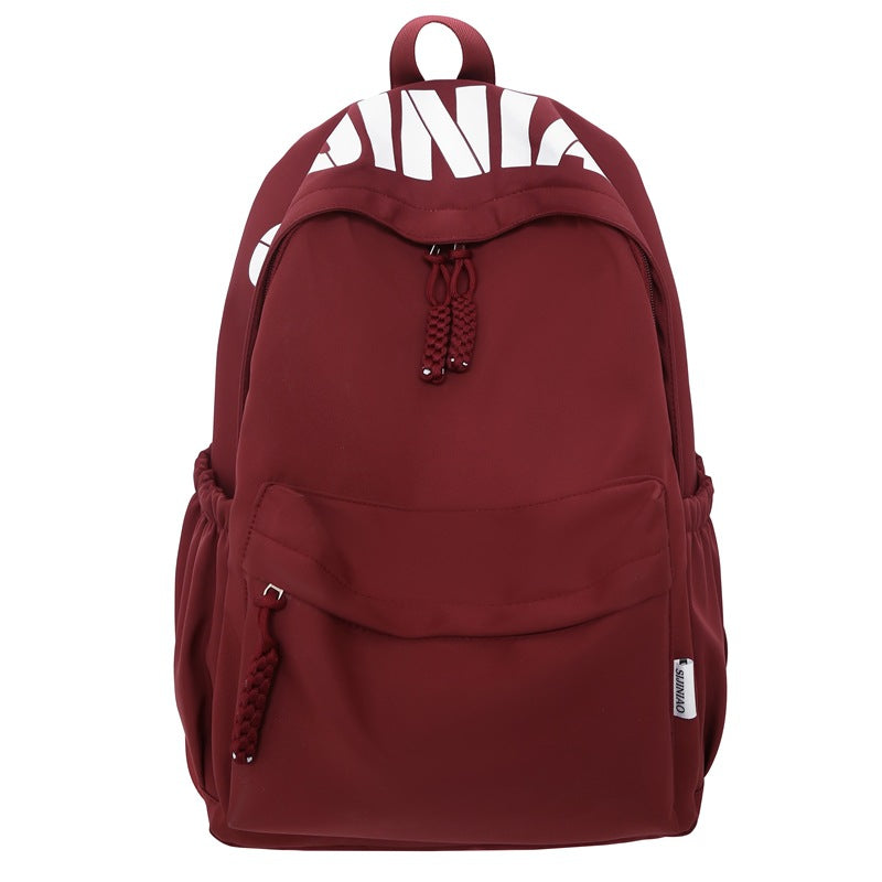 Stylish unisex everyday school backpack in vibrant colors. Durable and versatile for students, travel, & commuting.