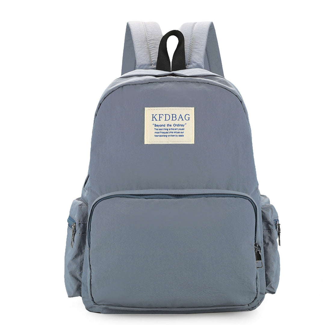 Organized minimalist everyday backpack, featuring durable lightweight material & spacious compartments for daily essentials.