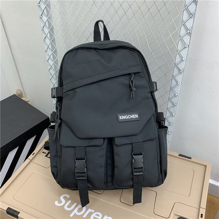 Unisex versatile outdoor rucksack, durable & waterproof for hiking, camping, and travel adventures.