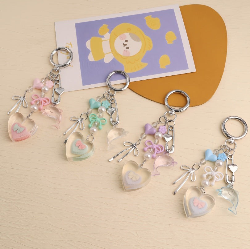 Cute plastic & metal vibrant keychain charm. Stylish bag accessory for keys or decoration.