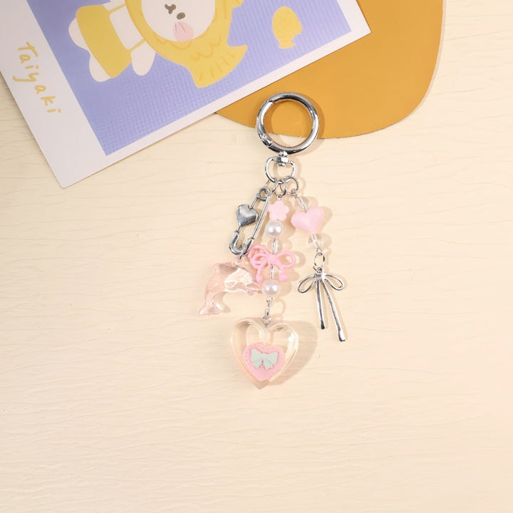 Colorful unisex bag accessory: a vibrant charm keychain, also serves as a key holder.