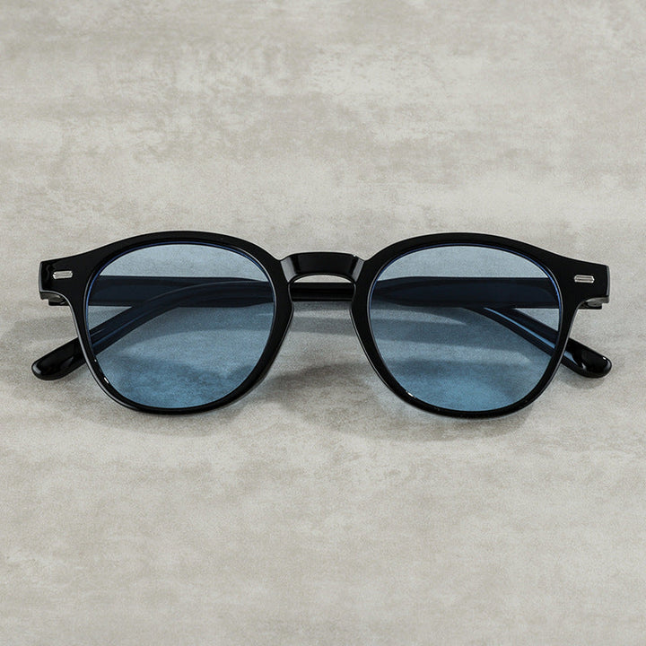 Modern unisex round eyewear with vintage flair, providing strong UV protection for all.
