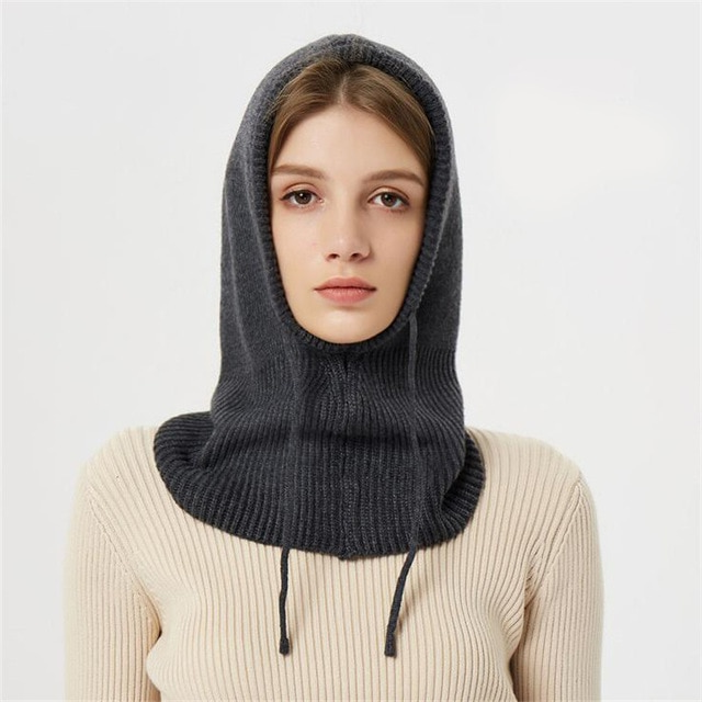 Warm unisex beanie with adjustable drawstrings, perfect for chilly winter days & outdoor activities.