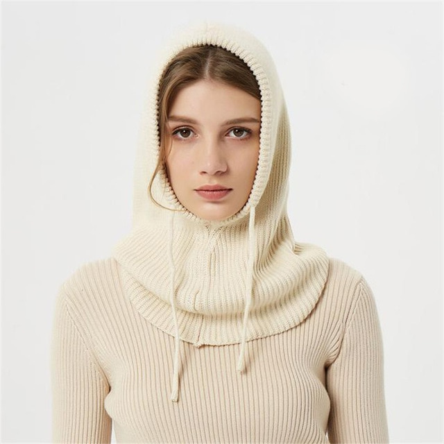 Soft knitted headwear: a warm unisex winter hat with drawstrings for cozy cold-weather protection.