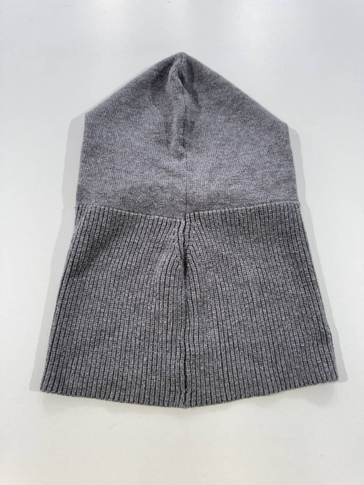 Comfortable knitted winter hat with drawstrings, a best-selling warm unisex beanie for chilly weather.