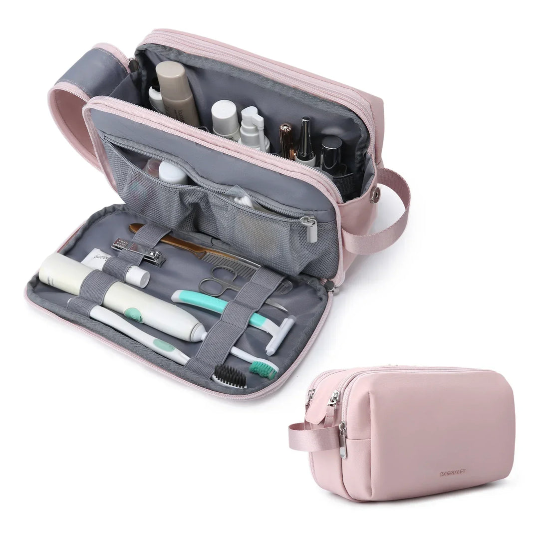 Unisex water-resistant travel toiletry bag with multiple compartments for organized travel essentials.