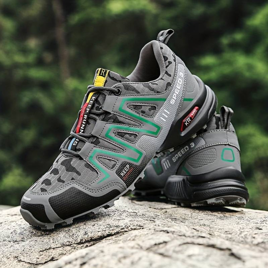 Green unisex waterproof hiking boots, ideal for rugged mountain trails. Durable outdoor footwear for trekking & adventure.