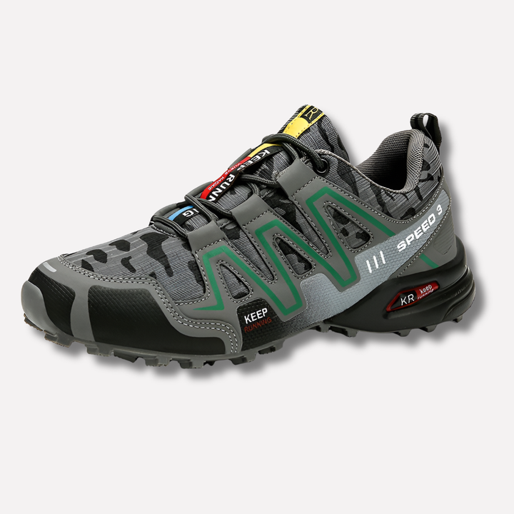 White unisex waterproof hiking boots for challenging mountain trails. Durable outdoor footwear for trekking adventures.