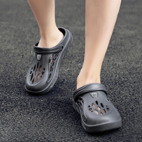 Comfortable unisex outdoor sandals with adjustable straps. Waterproof design for beach & summer wear.