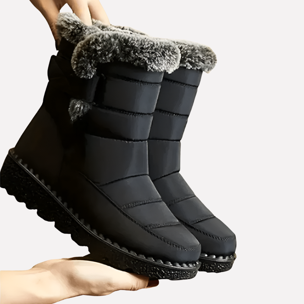 Durable unisex winter boots, waterproof & warm, perfect for snow, ice, and cold weather walking. Features comfortable fit.