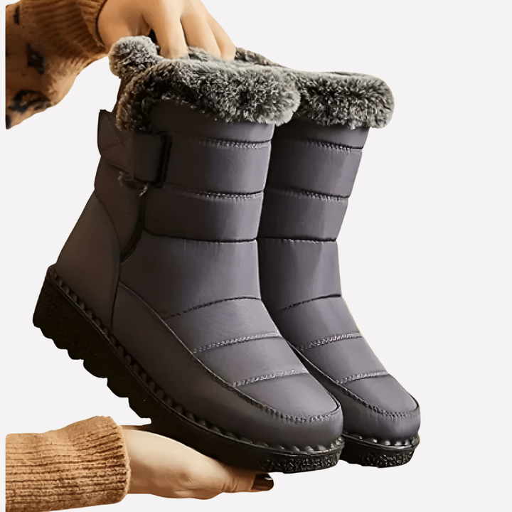 Stay warm & dry with these unisex waterproof winter snow boots. Ideal for cold weather, outdoor activities, featuring non-slip grip.