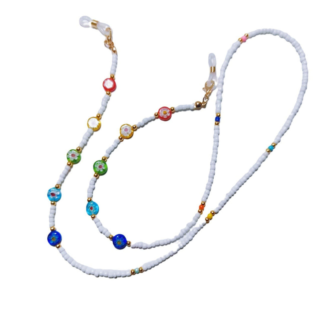 Elegant white beaded eyewear chain, keeps your glasses secure and accessible around your neck.
