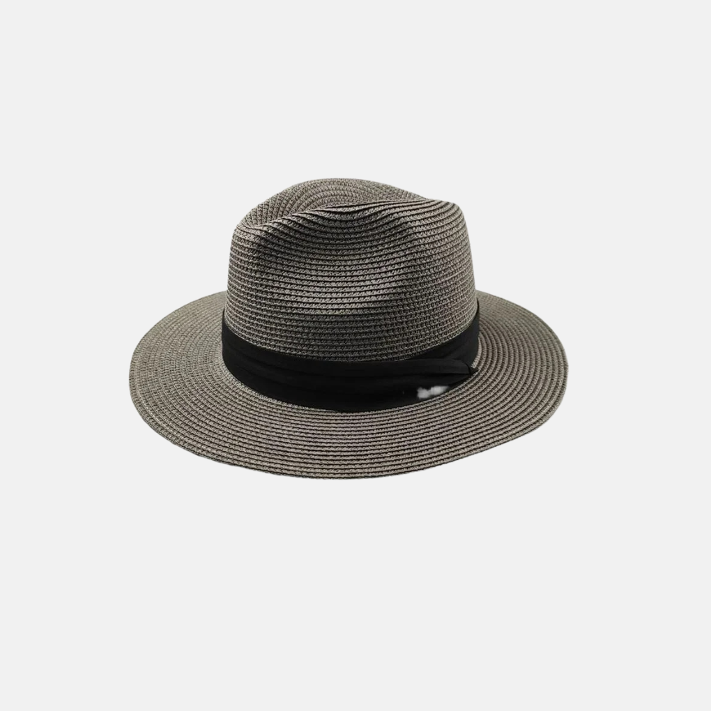 Wide brim straw sun hat offering ultimate UV protection. Unisex design, ideal for beach, travel, and casual summer wear.