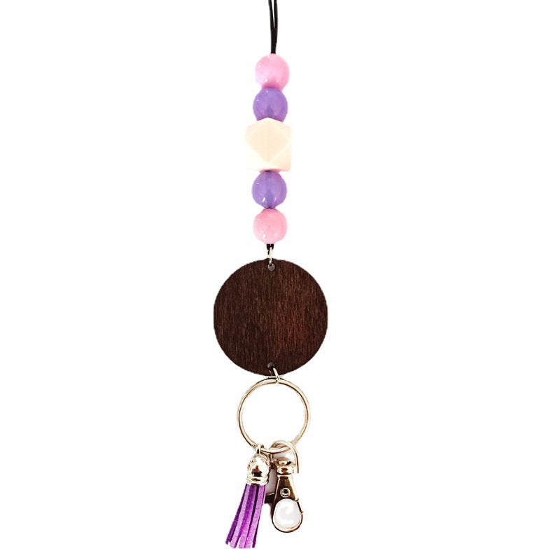 Unisex wooden beaded keychain with colorful natural wood beads, perfect everyday key holder accessory.