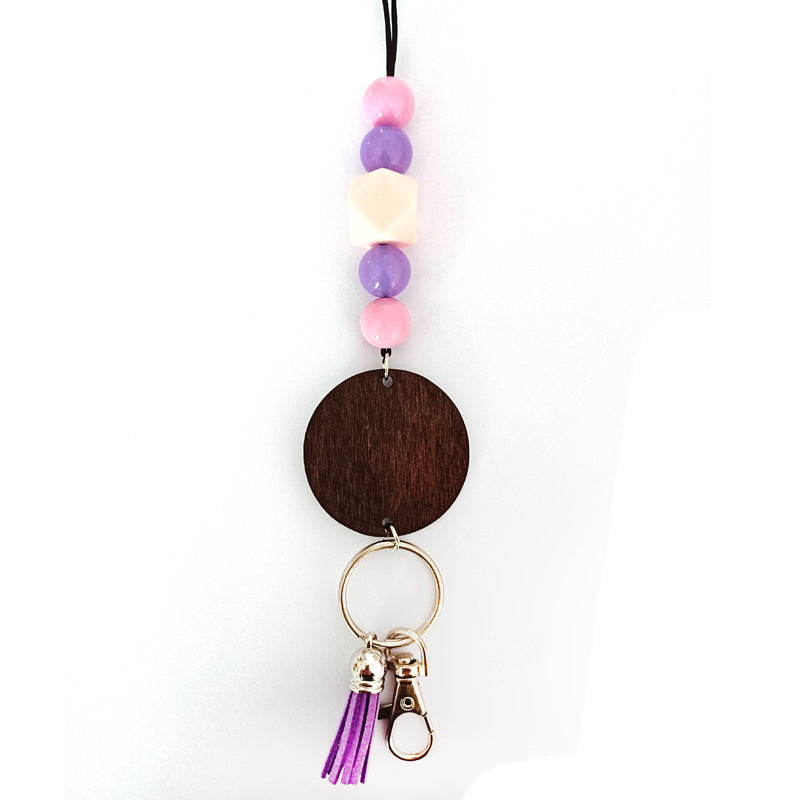 Everyday unisex wooden beaded keychain, colorful and charming accessory, perfect gift idea or personal use.