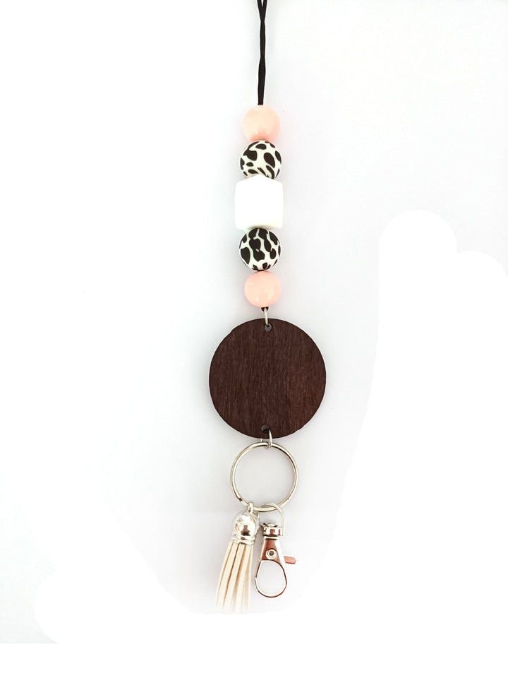 Smooth wooden beaded keychain, a tactile and colorful unisex key holder accessory, perfect for everyday use.