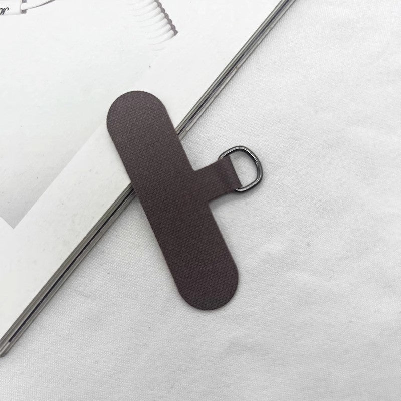 Slim fabric bookmark, ensuring a seamless reading experience.