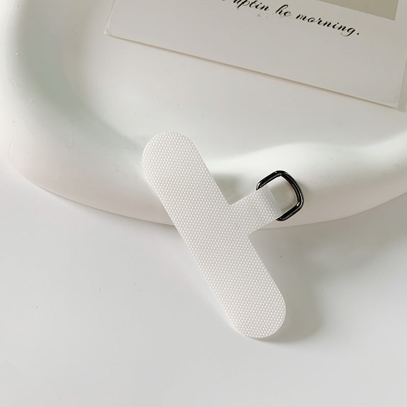 Elastic fabric page marker for avid readers, holding book.