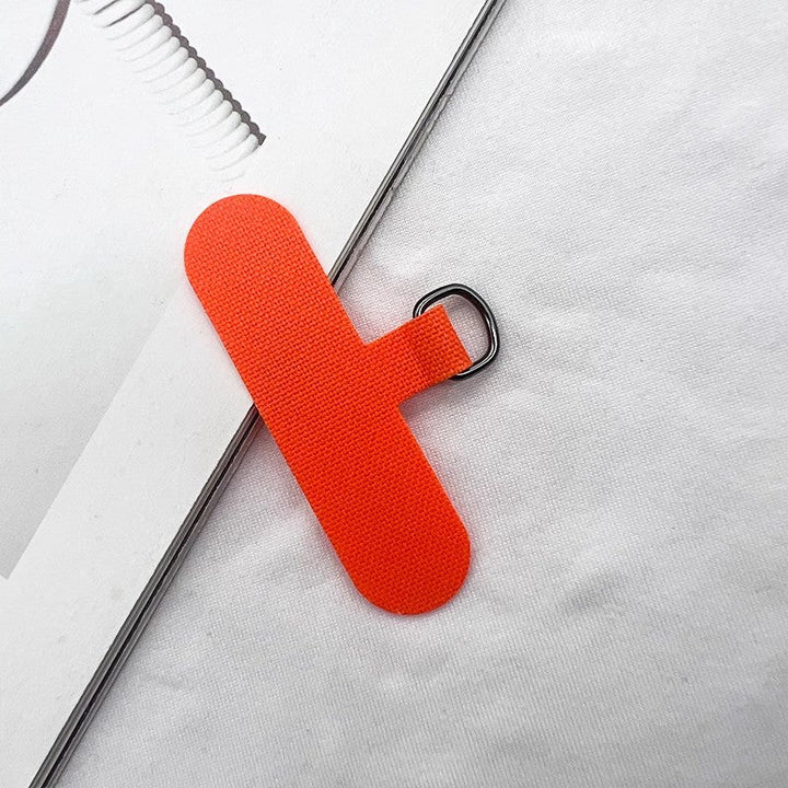 Close-up of a secure book page marker on a textbook.